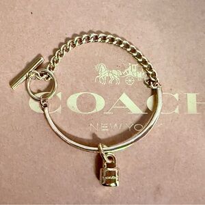 Coach Gold-tone Stamped Padlock Chain Toggle Lock Bracelet
